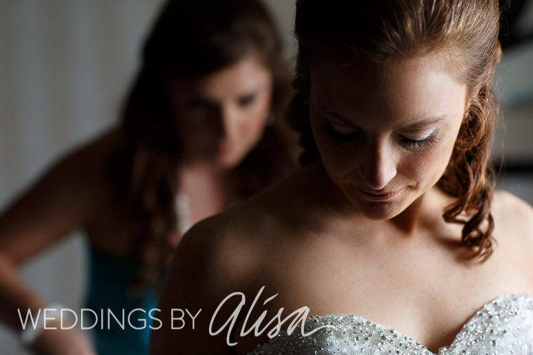 Bride getting ready for her wedding at the Double Tree Monroeville