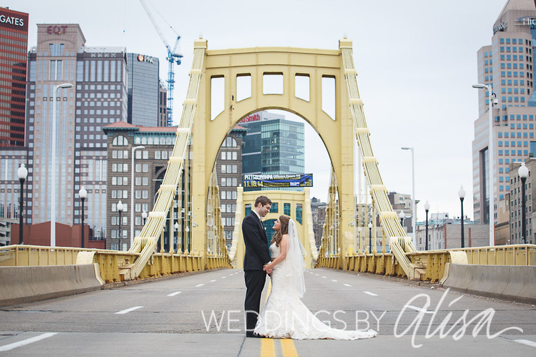 Bride and Groom wedding photos on yellow bridge in Pittsburgh