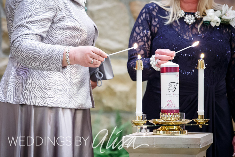 Mothers lighting the unity candle