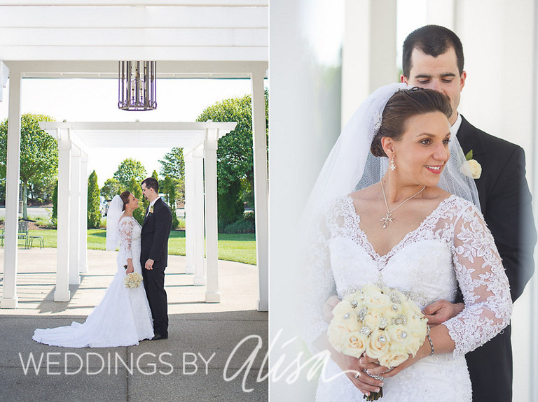 White roses and brooches in wedding bouquet