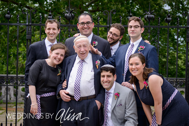 Groom with groomsmen and women in Mellon Park