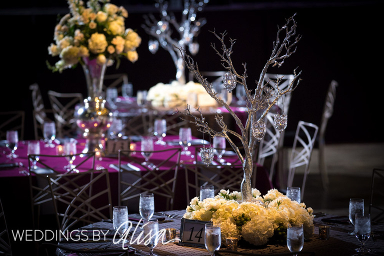 Tall centerpieces and candles at wedding reception in Pittsburgh