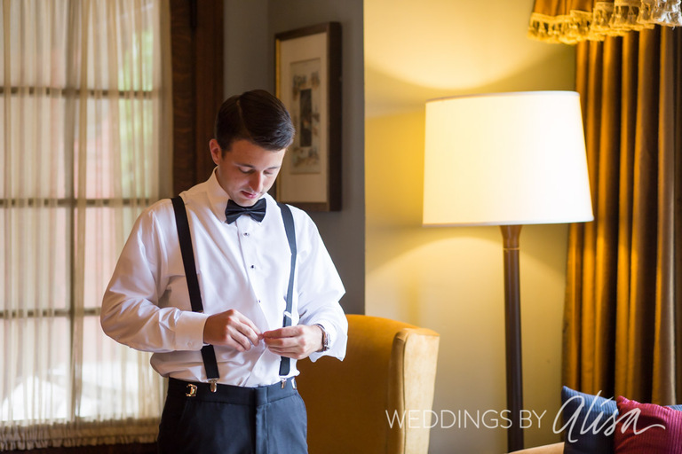 Groom in suspenders 