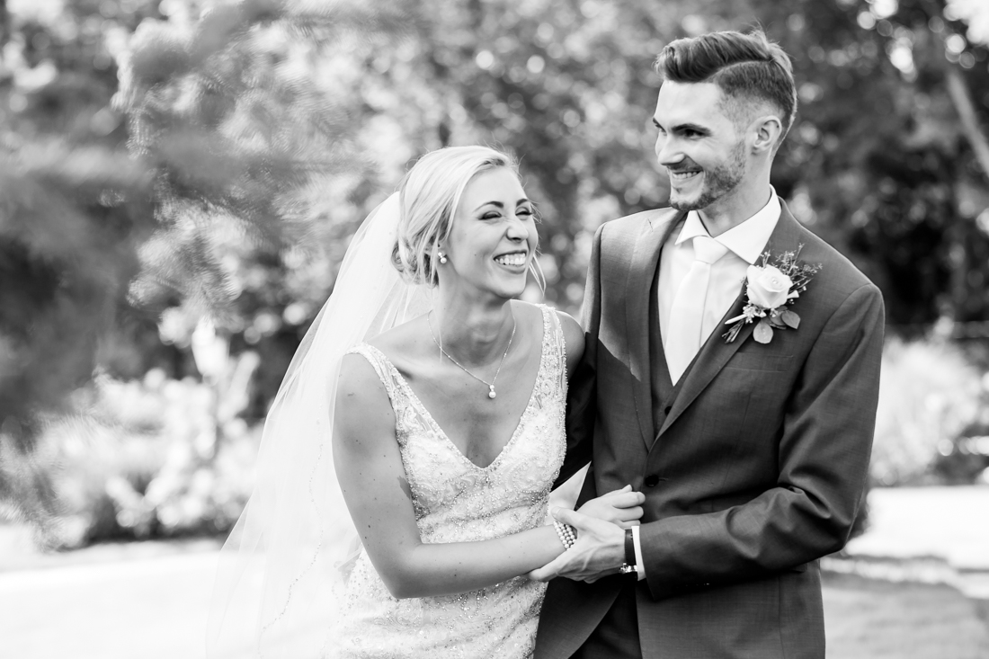 Bride and Groom having fun on their wedding day
