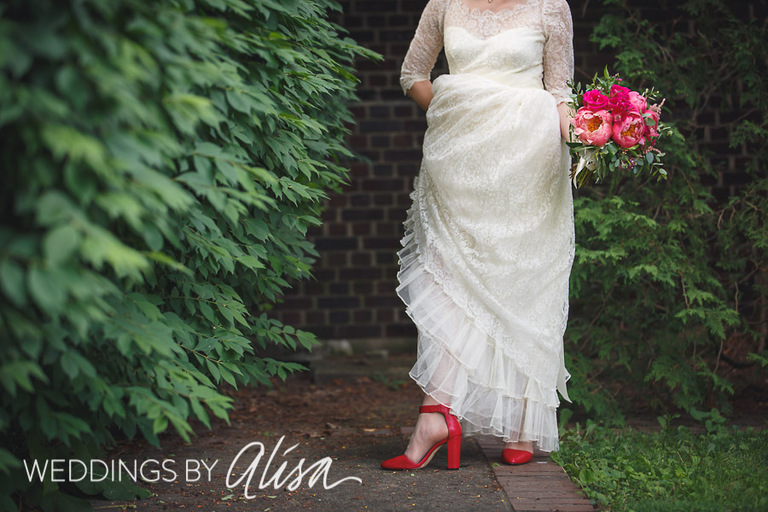 Red shoes dark pink wedding flowers