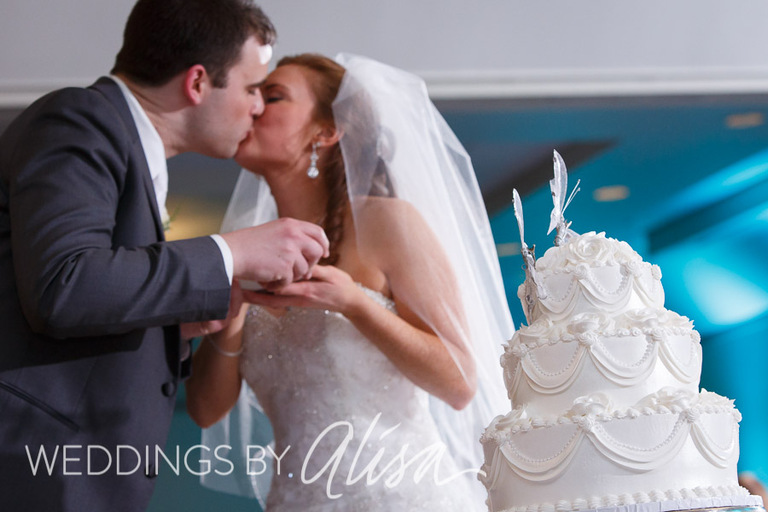 Bride and Groom eating wedding cake in Pittsburgh