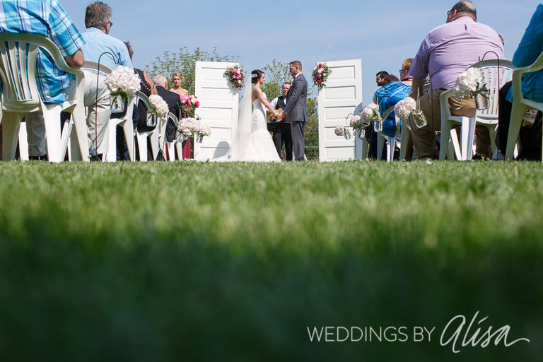 Sunny day wedding ceremony outdoors