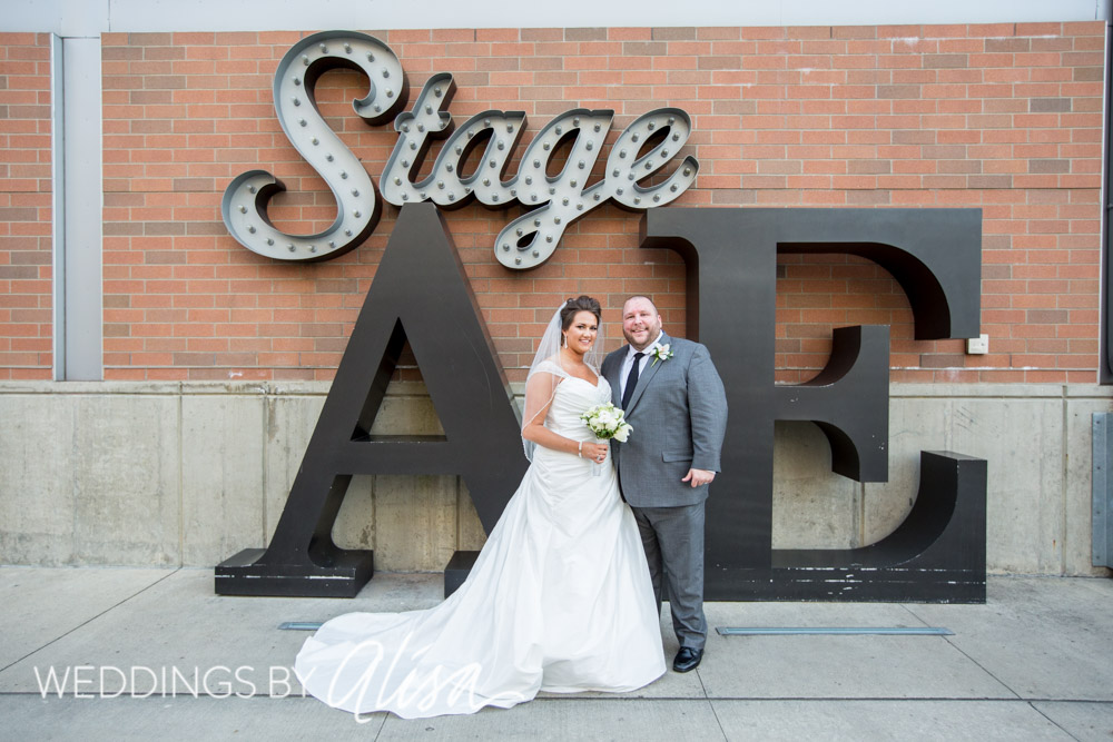 Bride and Groom with Stage AE Sign